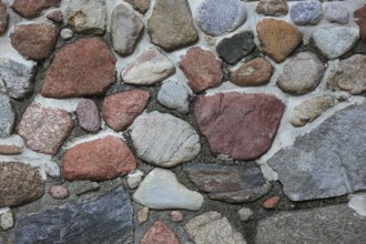 Stone wall with rough surfaces and versatile tones