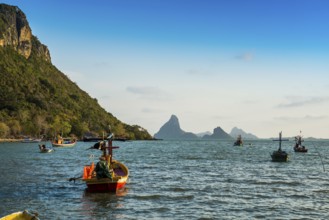Bay with mountains and fishing boats, sunset, Prachuap Khiri Khan, Prachuap Khiri Khan Province,