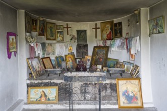 Interior view of an altar with religious icons and decorations on the walls, Holy Cross Chapel,