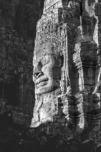 Huge stone-carved face of Bodhisattva Lokeshvara, also Avalokiteshvara, Bayon Temple, Angkor Thom,