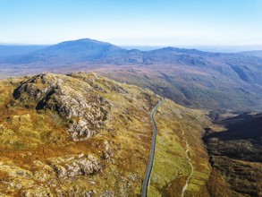 Autumn colours of Pen-y-Pass over Miner's Track, Start Point and road A4086 from a drone,