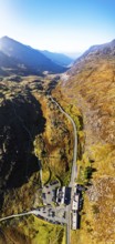 Autumn colours of Pen-y-Pass over Miner's Track, Start Point and road A4086 from a drone,