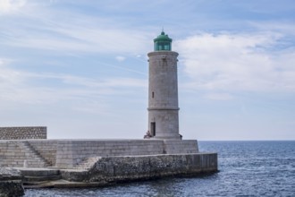 Lighthouse at the entrance of Cassis, lighthouse in the port of Cassis, Provence,