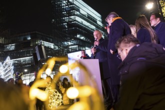 Kai Wegner, Governing Mayor of Berlin, gives a speech in front of turning on the Christmas lights