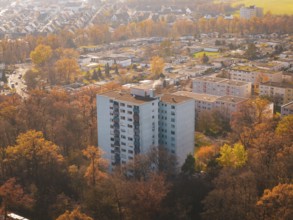 Multi-family house in autumn surroundings, surrounded by an urban silhouette, MÃ¼hlacker, Enzkreis,