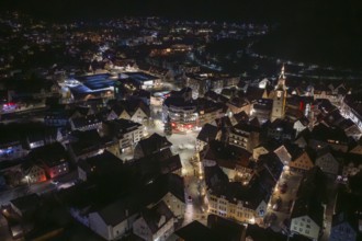 Extensive night view of a city with many illuminated buildings, Nagold, Calw district, Germany
