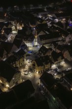 Aerial view of a city at night with illuminated streets and buildings, Nagold, Calw district,