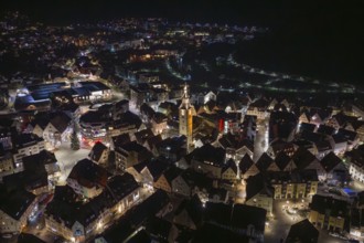 Nocturnal view of an urban landscape with illuminated roads and a church, Nagold, Calw district,
