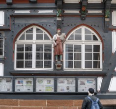 Decoration on half-timbered house, former press house, market, Oberstadt, Marburg, Hesse, Germany
