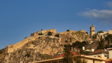 Palamidi Fortress, mighty castle spread over a hill with ruins under blue sky, Nauplion, Nafplion,