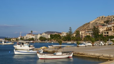 Nauplion Harbour, Palamidi Fortress, Two boats in the calm water of a picturesque coastal port,