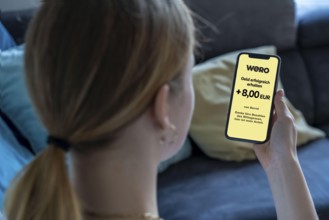 Symbol image, photo montage, to the European WERO payment service, sending or receiving money