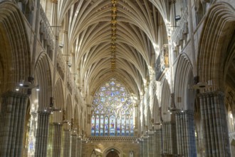 View to west window, vaulted ribbed ceiling inside Exeter cathedral church, Exeter, Devon, England,