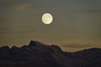 View of snow-covered Titlis from Horben in the light of a full moon, Beinwil-Freiamt, Canton,