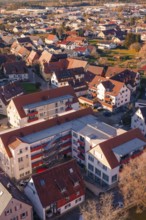 Close-up of residential buildings in a village with typical regional architecture and autumn
