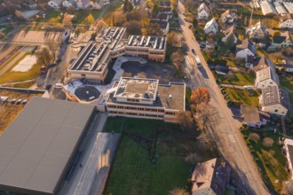 Aerial view of a building complex with a view of surrounding roads and countryside, Althengstett,