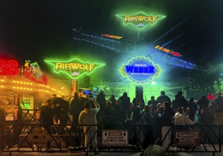 Many people at the All Saints Fair at night, the biggest old town fair in Europe, Soest, North