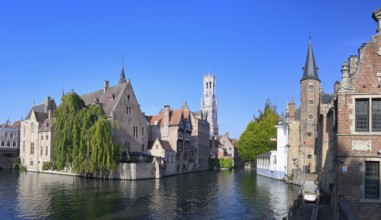 Famous view of Bruges old city with the Belfry and the Dijver canal, Bruges, Flanders, Belgium