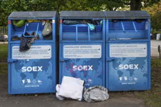 Overcrowded clothing containers in a parking lot, Hanseatic City of LÃ¼beck, Schleswig-Holstein,