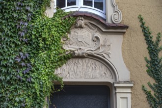 Stucco decoration above the entrance to Johanneum, built in 1905, near St. Johannis 1-3, Hanseatic