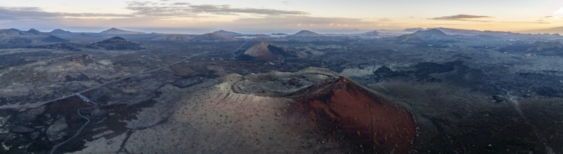 Caldera Colorada volcano, picturesque volcanic landscape with volcanic craters at sunrise, Los