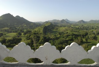 Hilly, green landscape of Aravalli Mountains in monsoon, view from Palace Hotel Devigarh, Delwara