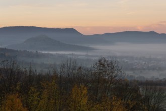 The majestic Teck Castle towers over the fog in the foothills of Alb. Aichelberg View of Teck