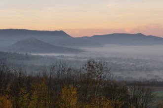The majestic Teck Castle towers over the fog in the foothills of Alb. Aichelberg View of Teck