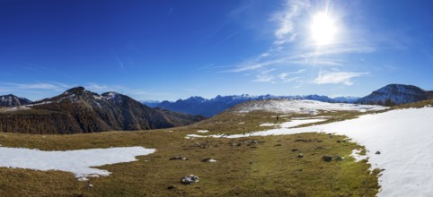 Snowfield on the Trattberg Alm with a view of the Hochwieskopf, Osterhorn Group, Salzkammergut,