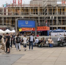 Collection of people on Alexanderplatz, Berlin, Germany