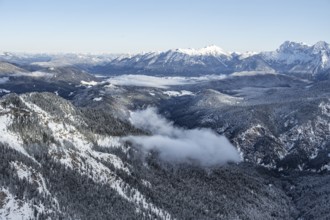 View of snow-covered mountain landscape across the Reintal towards the Estergebirge and