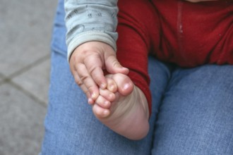 Hand and foot of a baby, half a year old, black and white, Mecklenburg-Vorpommern, Germany