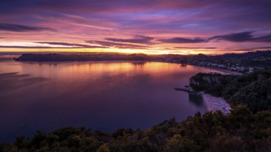 Landscape with sea and sandy beach in New Zealand. View of Lonely Bay and Cooks Beach from