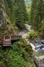 Wooden walkway on the Diosaz mountain river in the gorge, Gorges de la Diosaz, Les Houches,