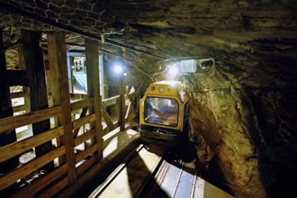 Yellow passenger subway in a tunnel in a salt mine, salt mine, Bex, Canton of Vaud, Switzerland