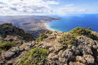 Castillejo viewpoint, view from the Risco de Famara cliffs to the coast and the sea with Famara