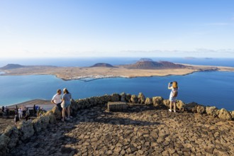 Tourists on the viewing platform at the Mirador del RÃ­o viewpoint, in the evening light, view of