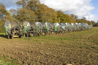 Rainstar E31 irrigation sprayer machinery in field, Shottisham, Suffolk, England, UK