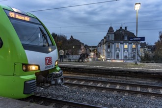 Essen-Steele S-Bahn station, passengers waiting for the train late afternoon, in autumn, Essen,