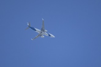 Boeing 737 jet passenger aircraft of El Al Israel airlines flying in a blue sky, England, United
