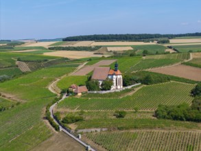 Pilgrimage church Maria im Weingarten, located in a rural setting of vineyards, aerial view, near