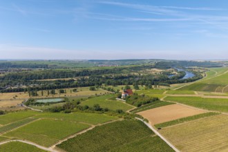 Pilgrimage church Maria im Weingarten, wide landscape view with vineyards, river and fields to the