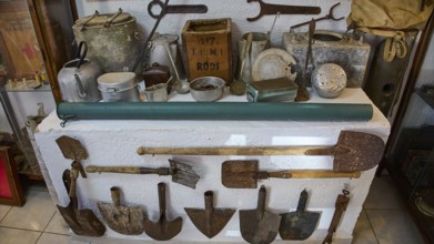 Exhibition of tools and cooking utensils mounted on a wall, War Museum, Military Museum, Private