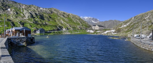 Panoramic photo of mountain lake Alpine lake Lac du Grand Gd Saint St Bernard, on the left souvenir