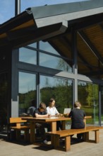 A woman develops mobile games and her sons are reviewing, testing, and refining the functionality