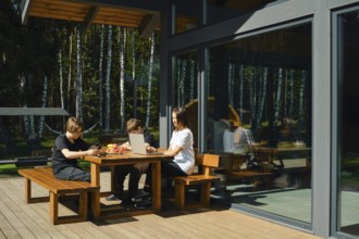 Woman develops mobile games and her sons are testing and refining the functionality and usability