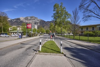 Road, traffic island, trees, lawn, mountain landscape, mountains, discounter, PENNY Markt GmbH,