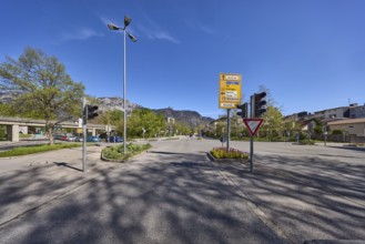 Roads, traffic lights, lantern, trees, signposts, shadow, general development, blue sky,