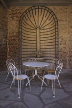 Seating area, seating group, rusty chairs, table, morbid, Maison Maurice Leblanc, museum in the