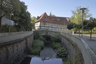Armoury museum built in 1668, half-timbered house, back, bridge over the Lauter, stream, Suhl,